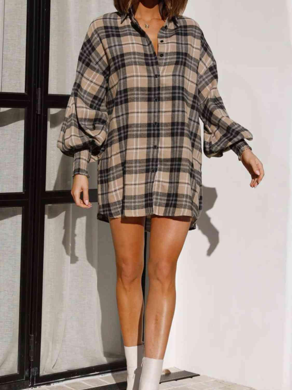 a woman in short shorts and a plaid shirt