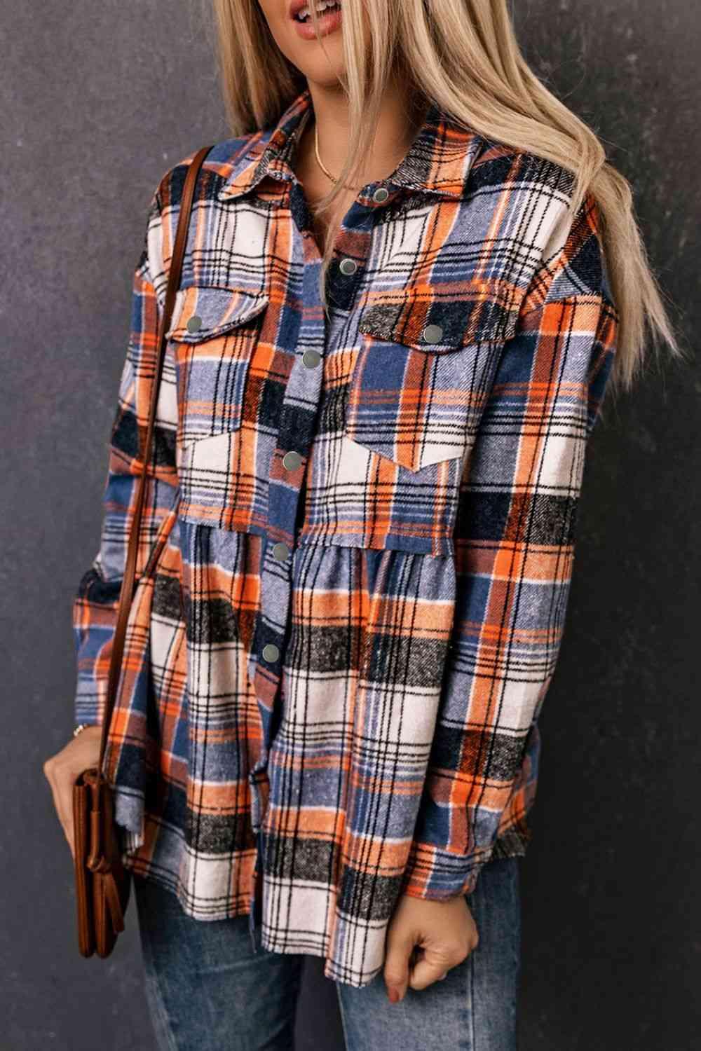 a woman wearing a plaid shirt and jeans