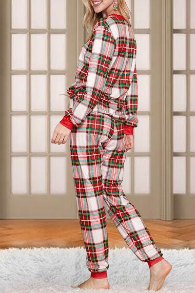 a woman wearing a red and green plaid pajamas