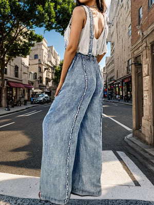 a woman standing on the side of a road