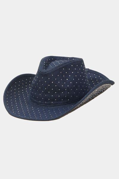 a blue hat with white dots on it