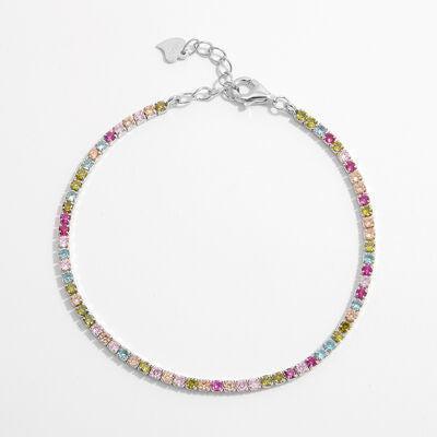 a bracelet with multicolored stones on a white background