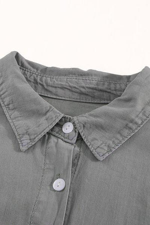a close up of a button down shirt