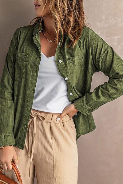 a woman in a green shirt and tan pants