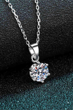 a diamond pendant on a chain