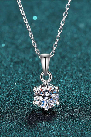 a diamond pendant on a chain