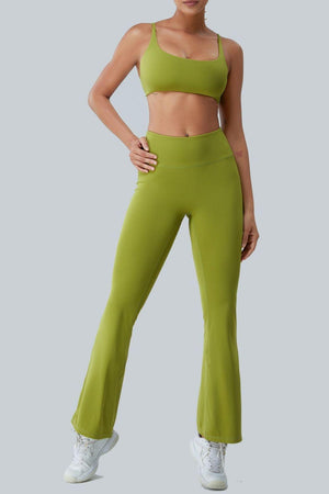 a woman in a green sports bra top and matching pants