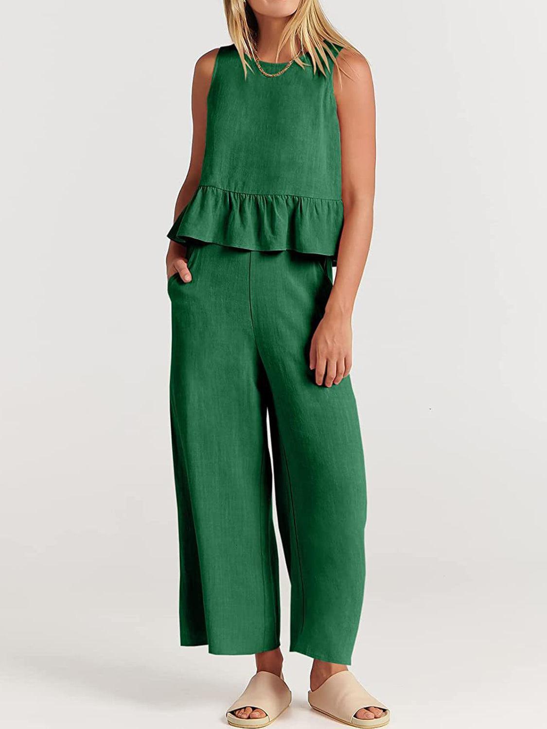 a woman in a green top and green pants