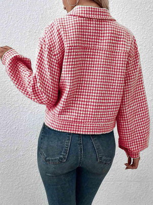 a woman wearing a red and white checkered shirt