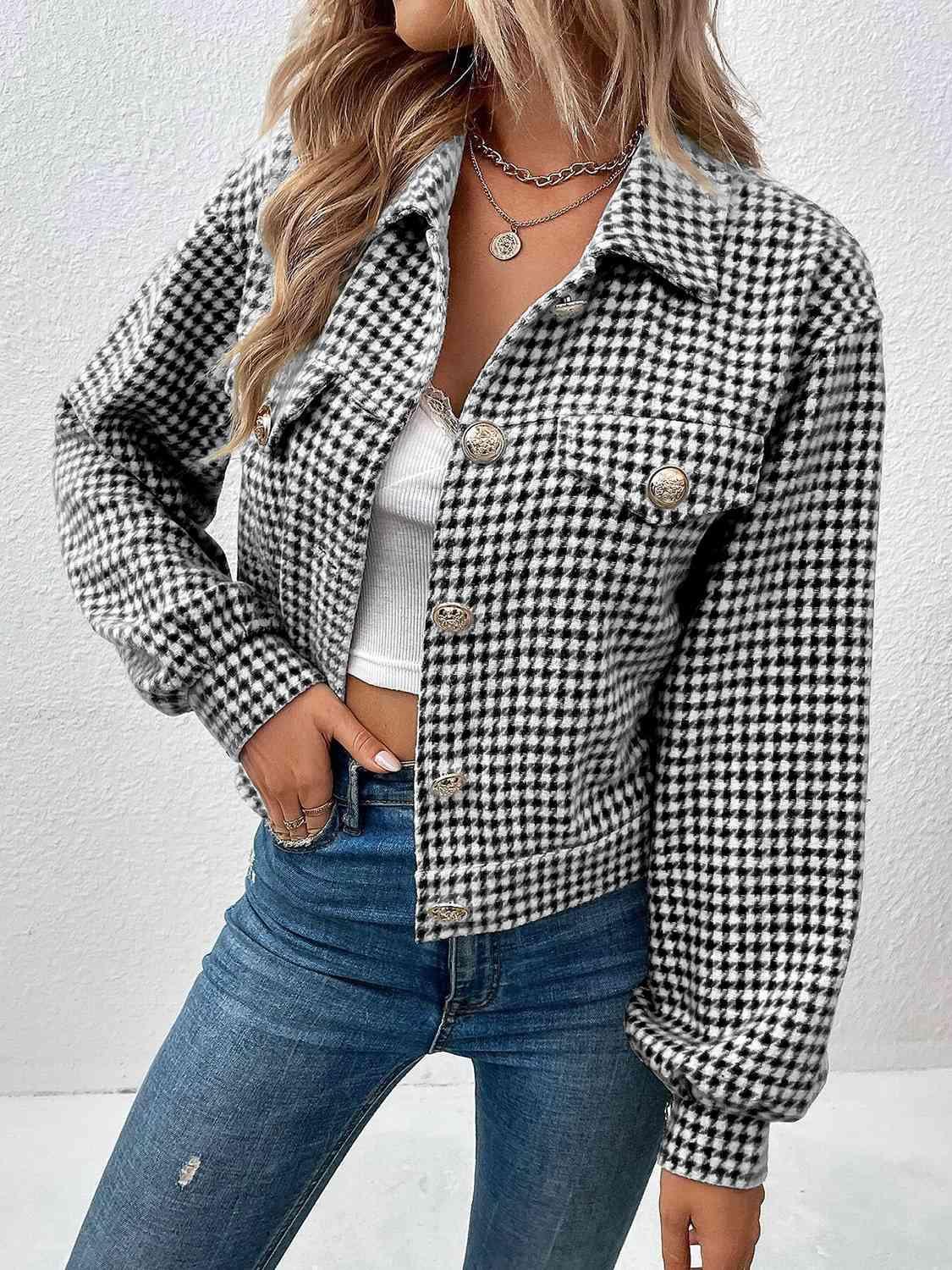 a woman wearing a black and white checkered jacket