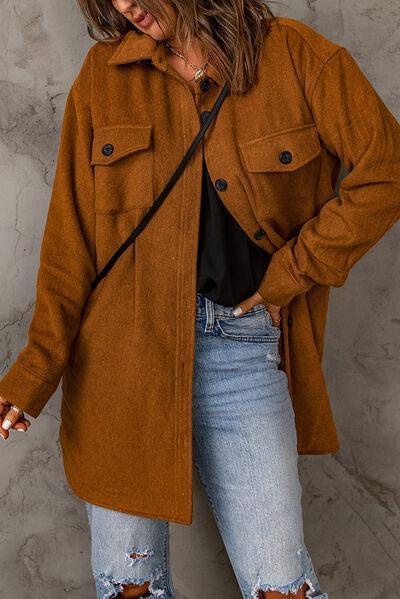 a woman wearing a brown coat and ripped jeans