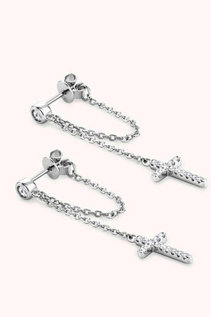 a pair of earrings with a cross on it