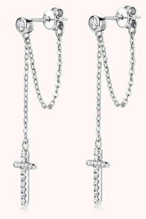 a pair of cross and chain earrings