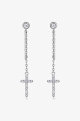 a pair of earrings with a cross on it