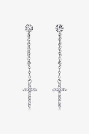 a pair of earrings with a cross on it