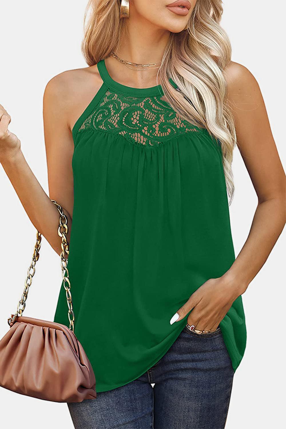 a woman in a green top holding a purse