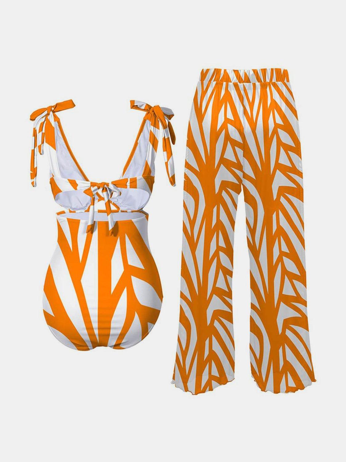 an orange and white zebra print top and pants