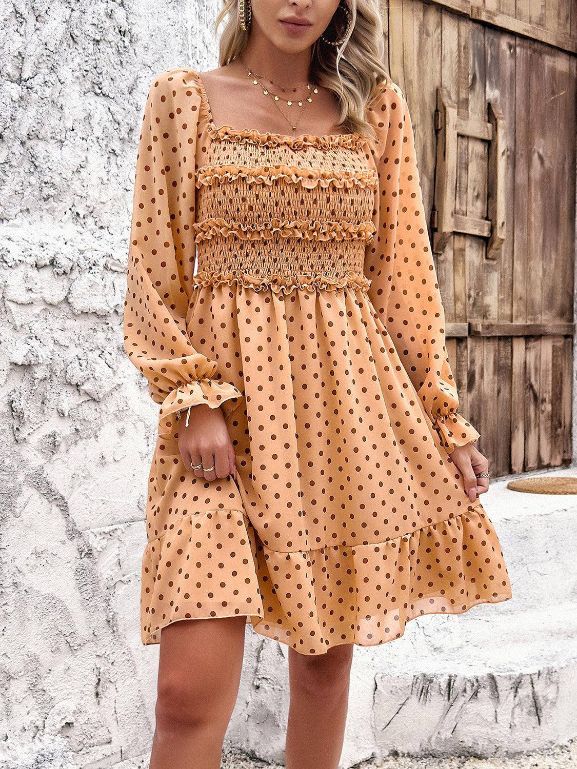 a woman wearing a polka dot dress