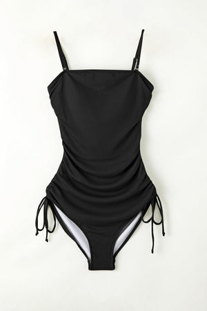 a black one piece swimsuit with straps