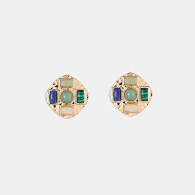 a pair of gold earrings with multicolored stones