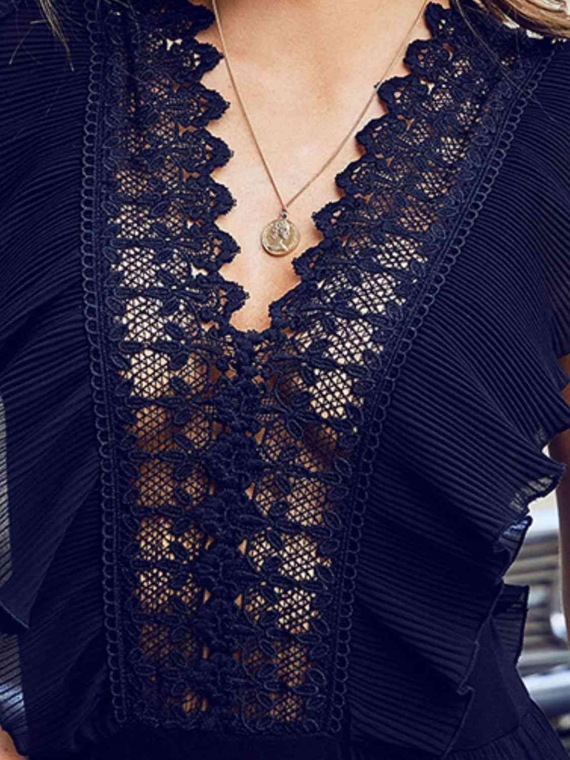 a close up of a woman wearing a black top
