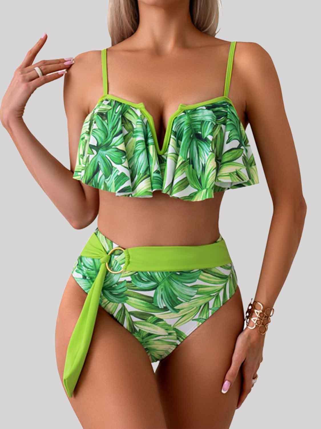 a woman in a green bikini top and matching panties