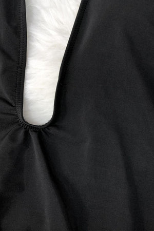 a close up of a black jacket with a white fur lining