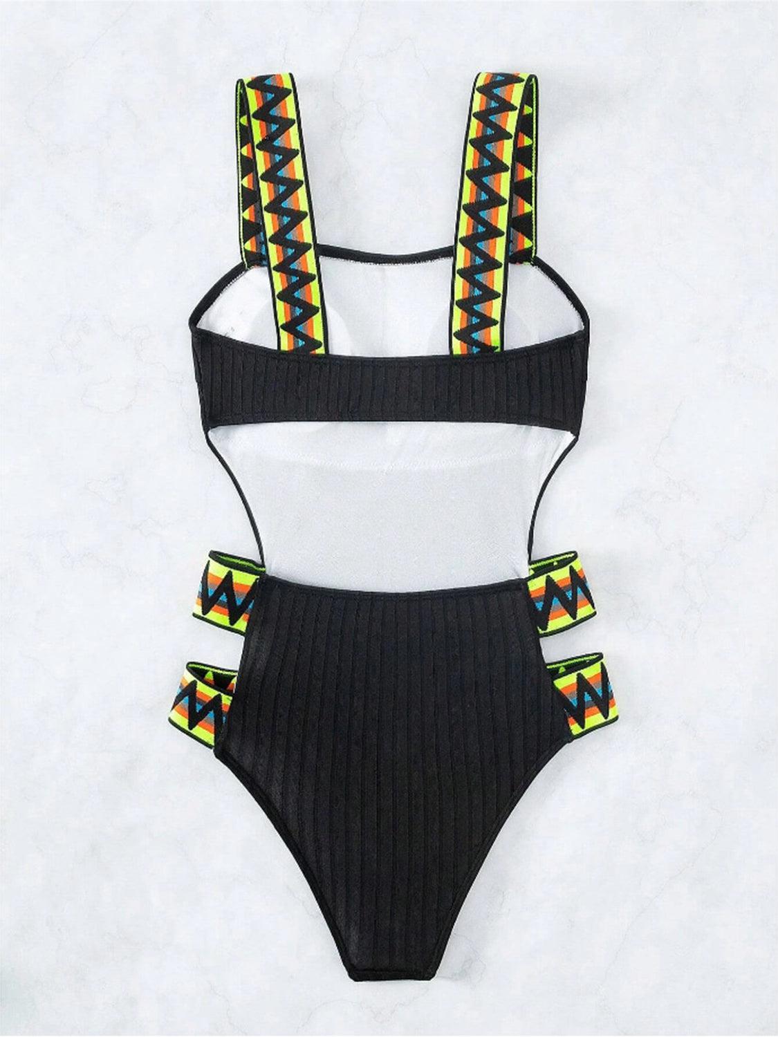 a bathing suit with straps on a white background