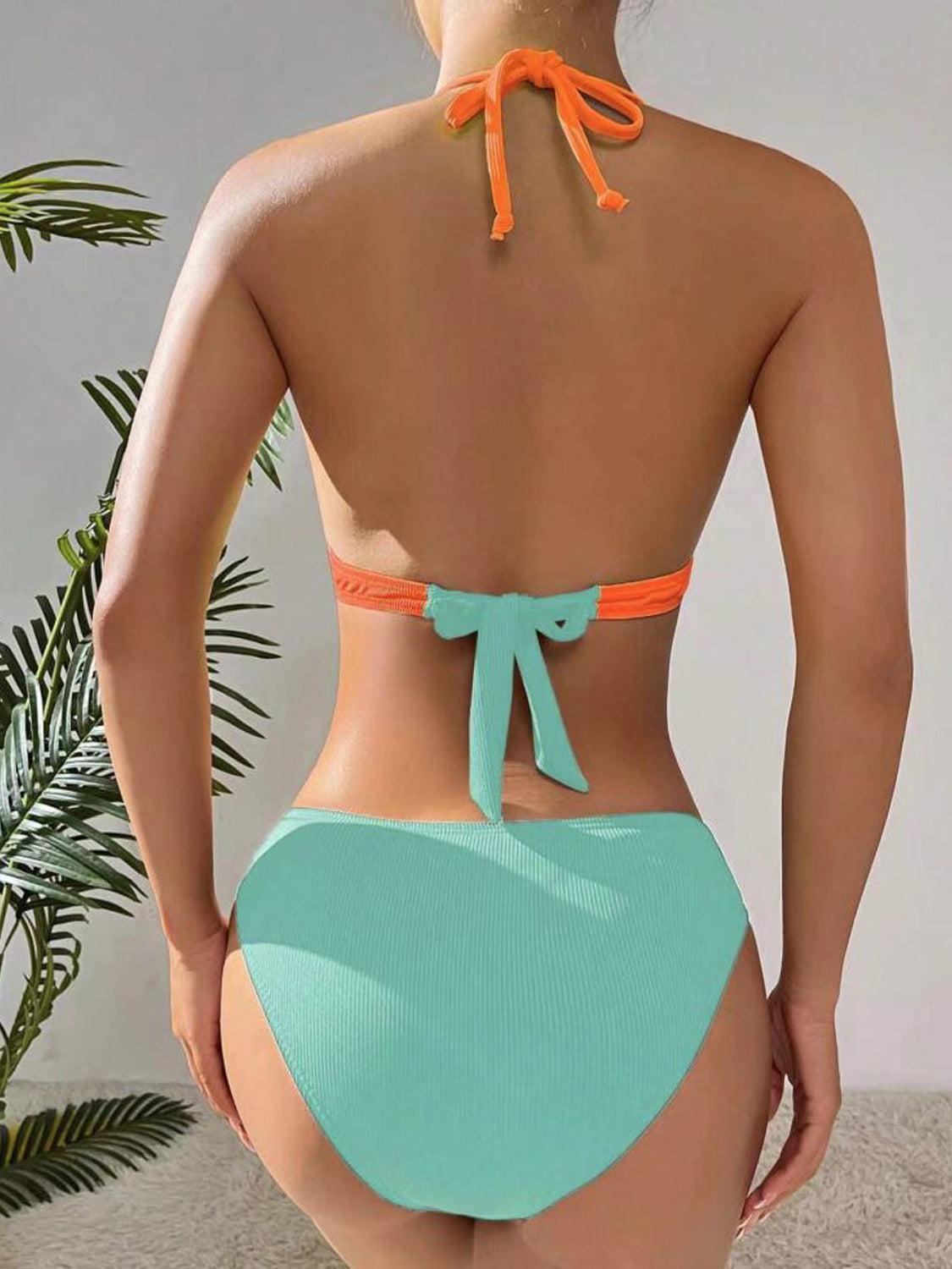 a woman in a bikini top and panties