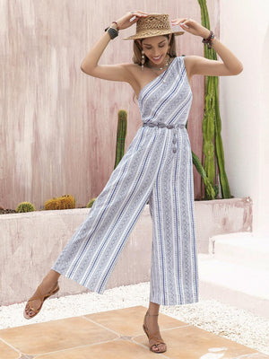 a woman in a blue and white striped jumpsuit