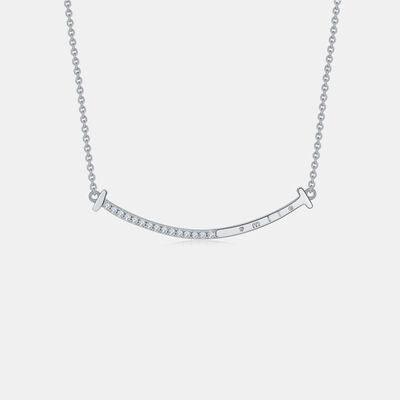 a silver necklace with a bar on it