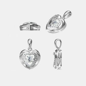 a set of jewelry including a heart pendant, ring, and earrings