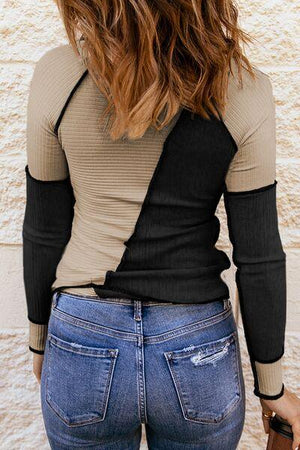 a woman in jeans and a top back view