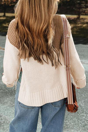 a woman with long hair walking down a street