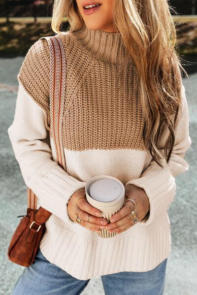 a woman holding a cup of coffee in her hands