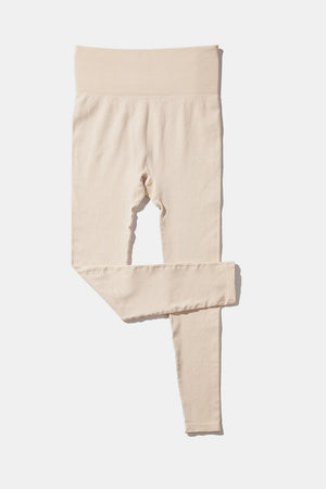 a pair of leggings on a white background