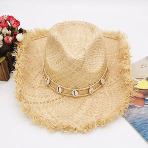 a straw hat sitting on top of a table
