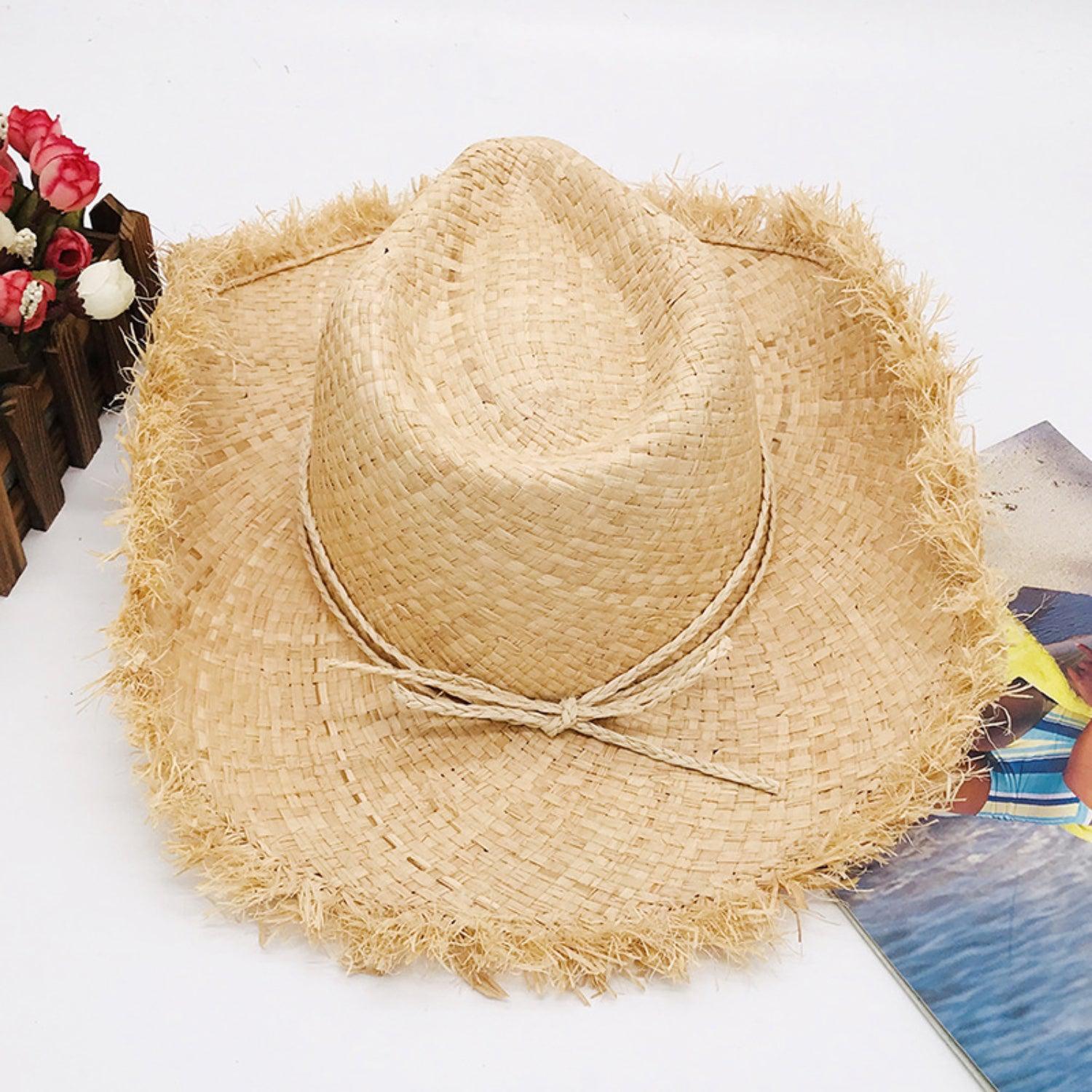 a straw hat sitting on top of a table