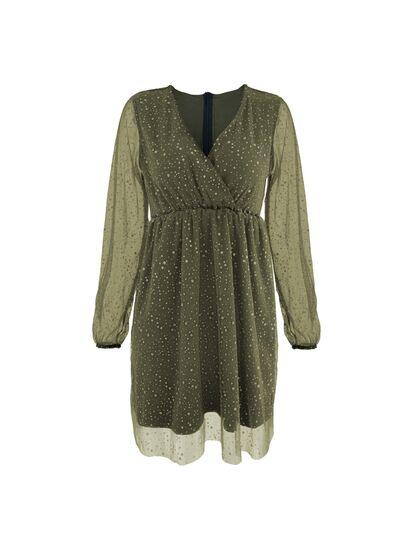 a green dress with white dots on it