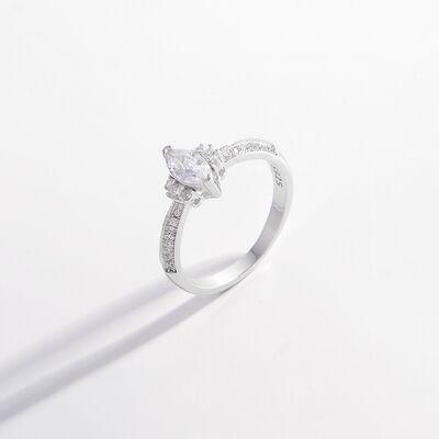 a white gold ring with diamonds on a white background