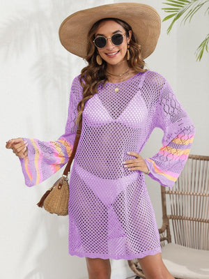 a woman wearing a purple dress and hat