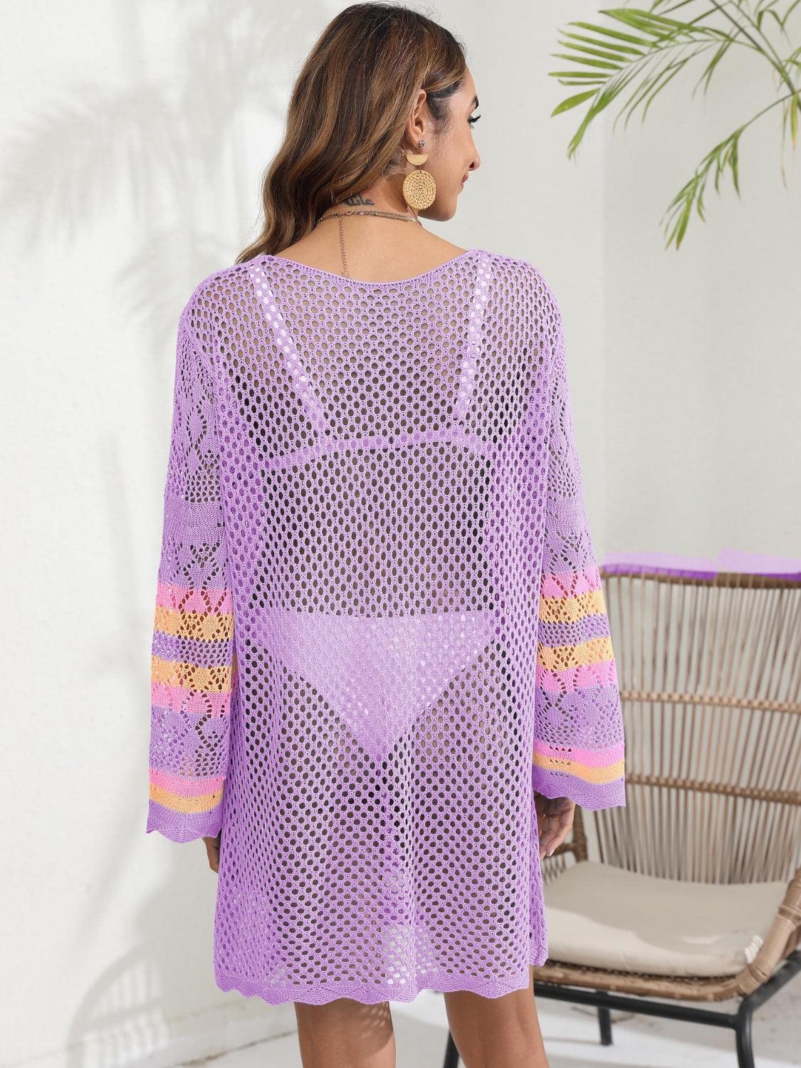 a woman wearing a purple crochet cover up