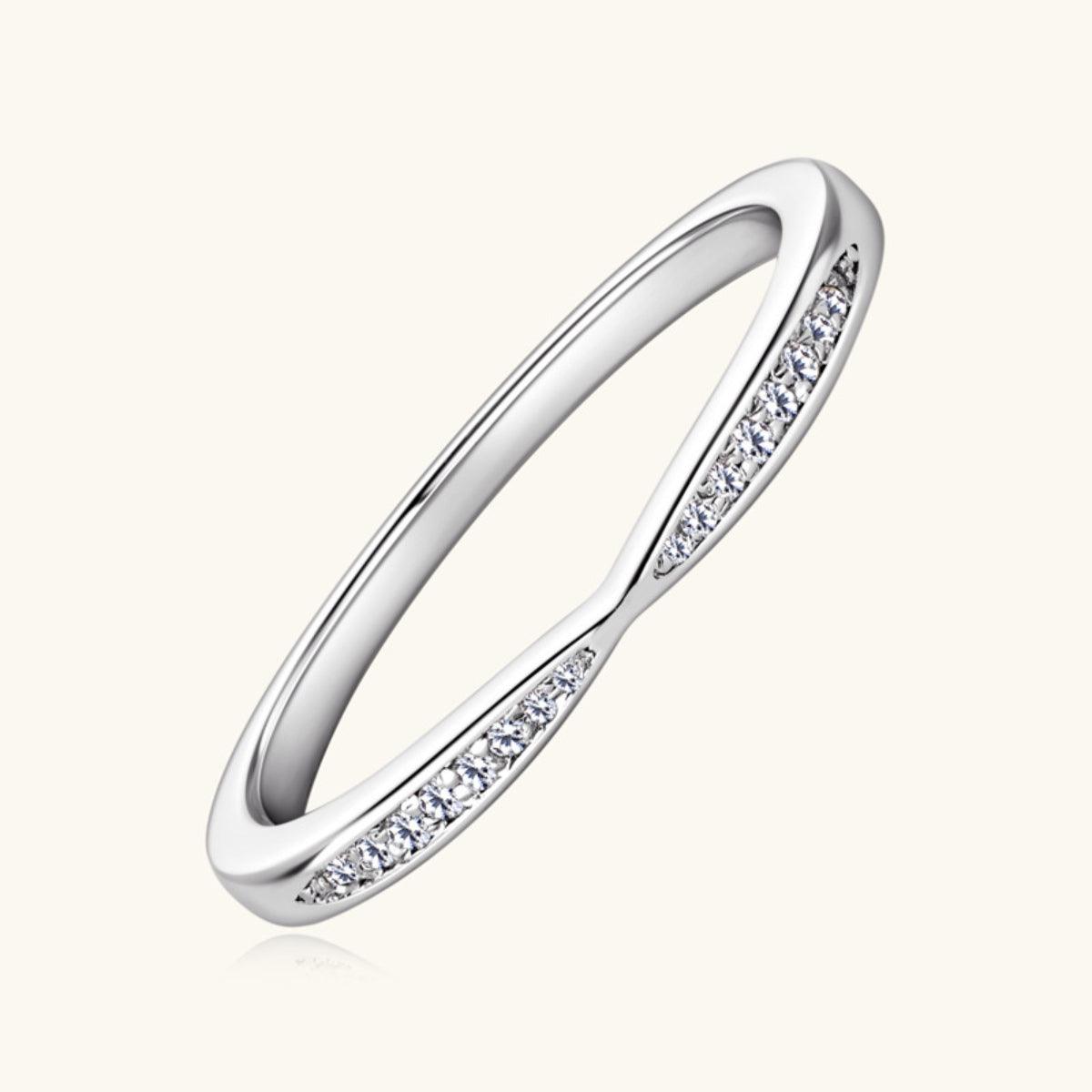 a white gold wedding band with channeled diamonds