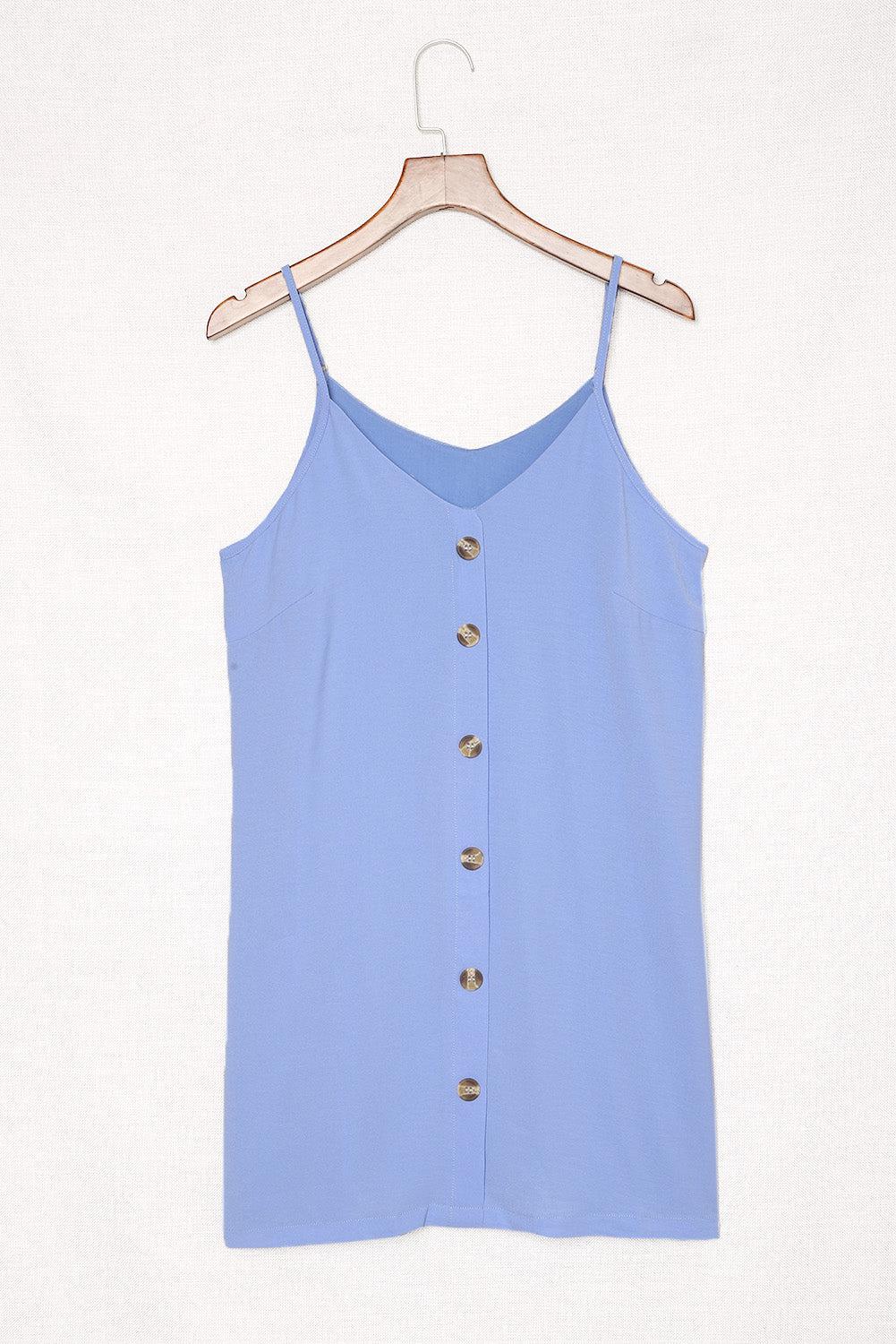 a blue top hanging on a wooden hanger