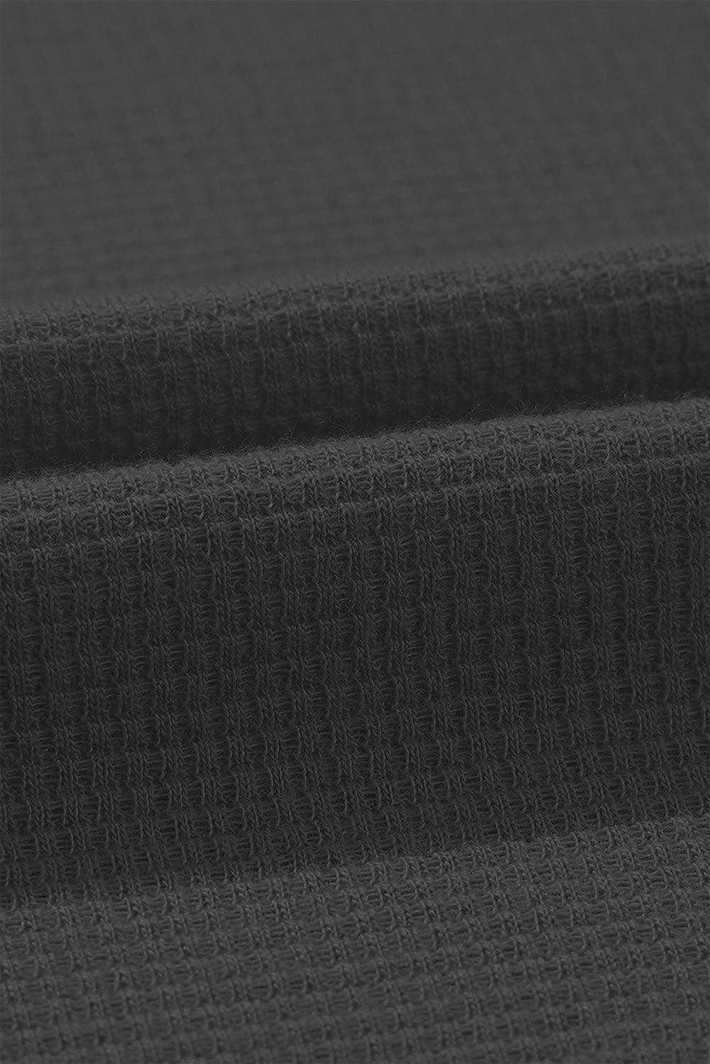 a close up of a dark gray fabric
