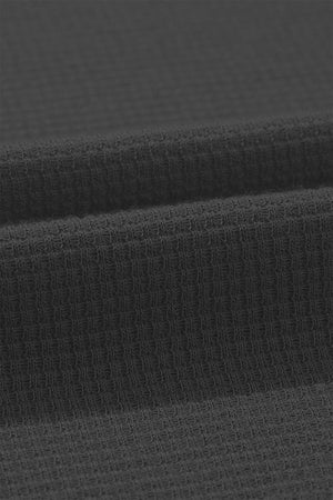 a close up of a dark gray fabric
