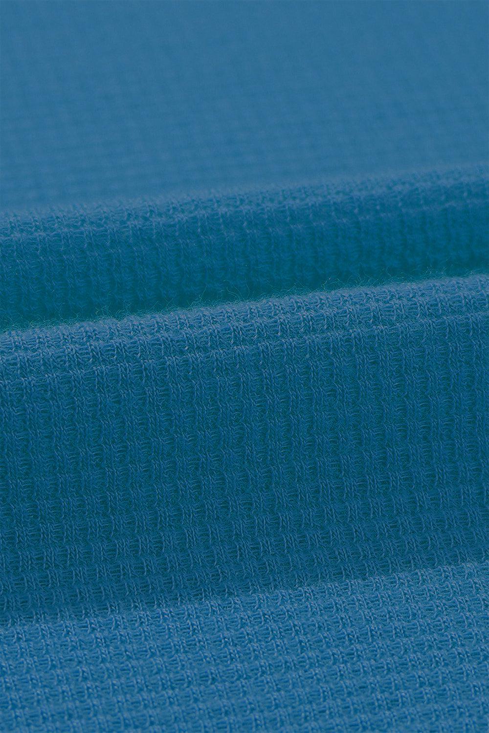 a close up of a blue fabric