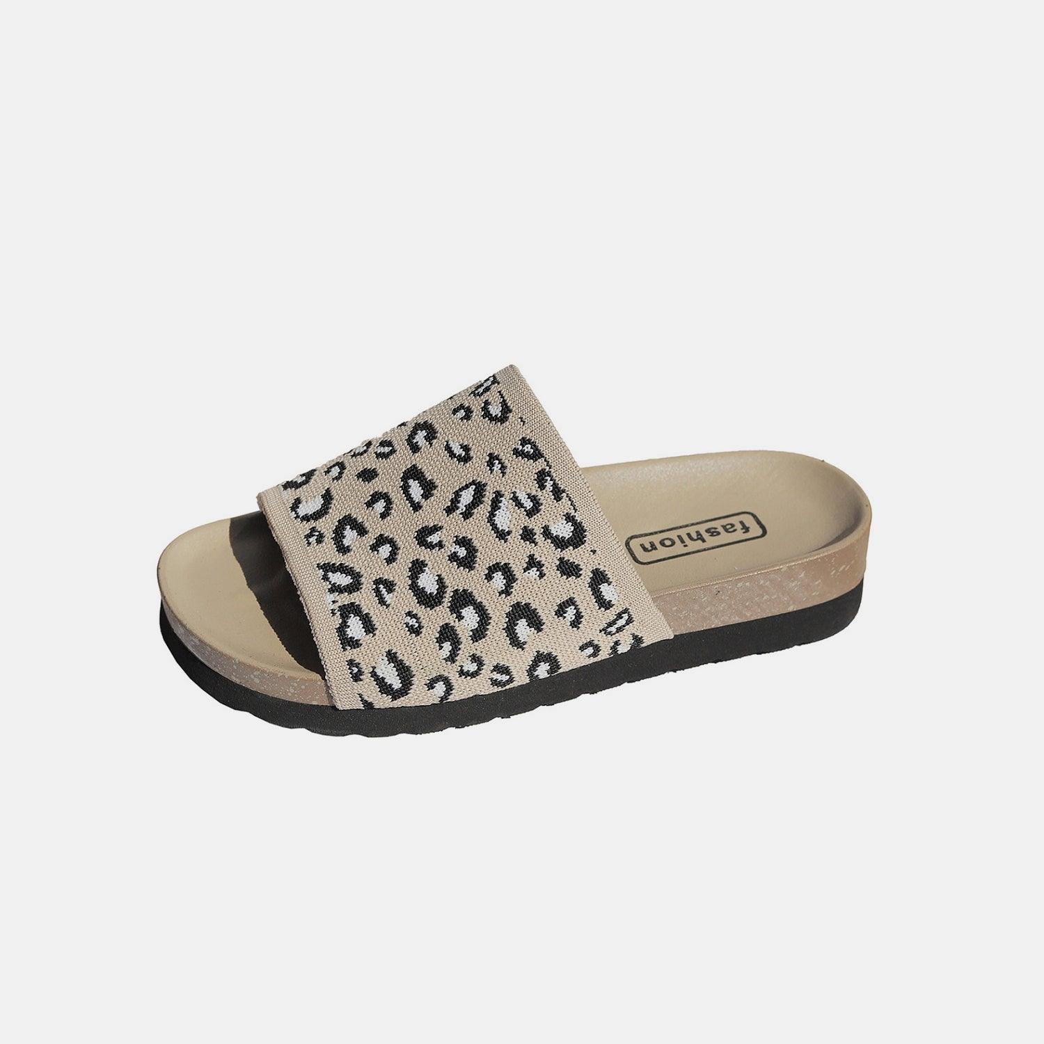 a women's sandal with a leopard print