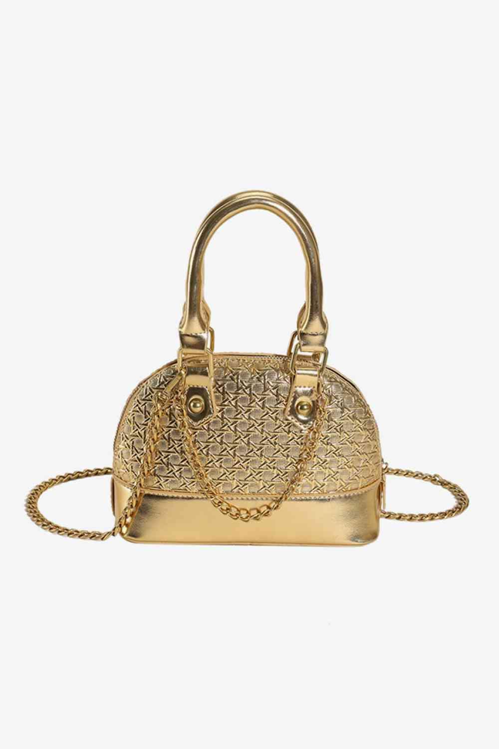 a gold purse with a chain strap