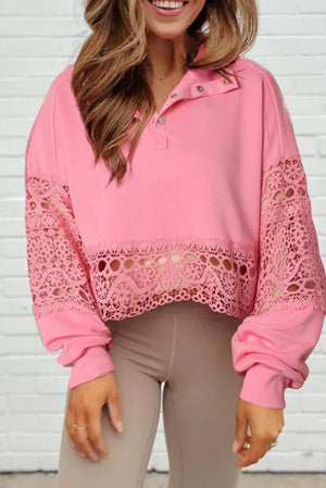 a woman wearing a pink sweater and leggings